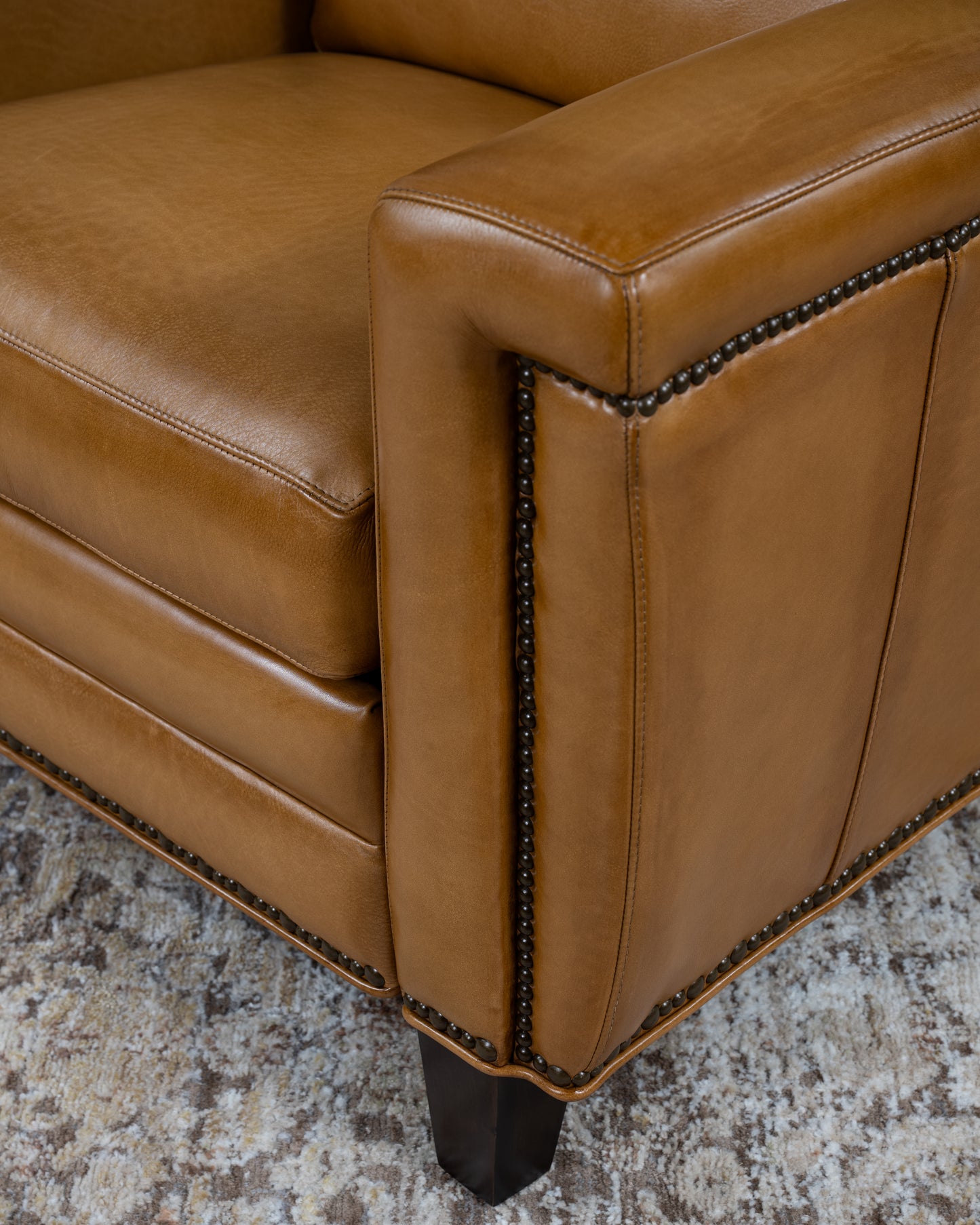 Revolver Saddle Leather Recliner